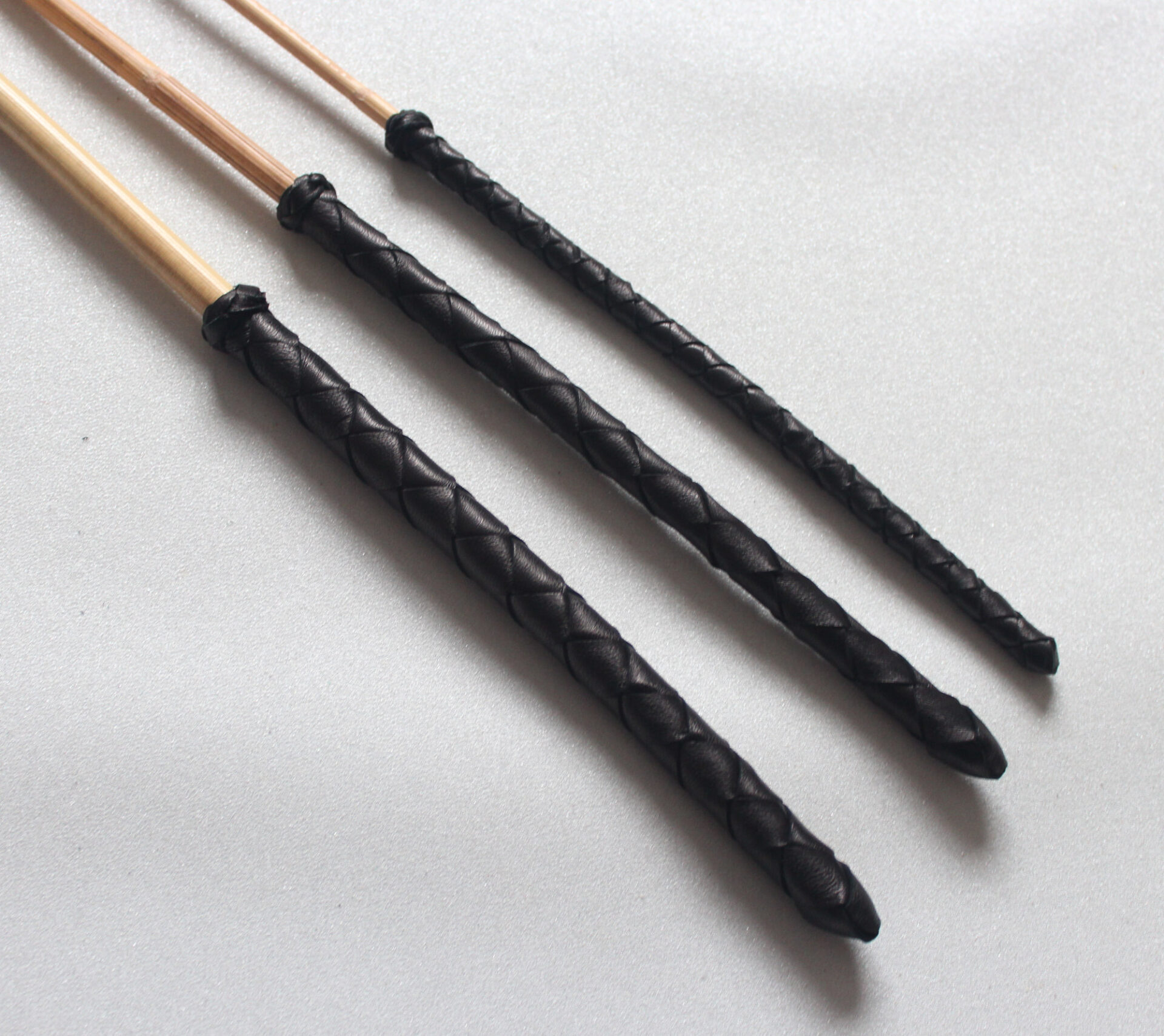 Kooboo cane set with braided leather handles