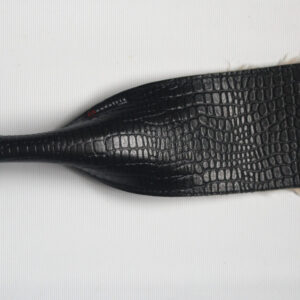 Fur and black leather strap paddle