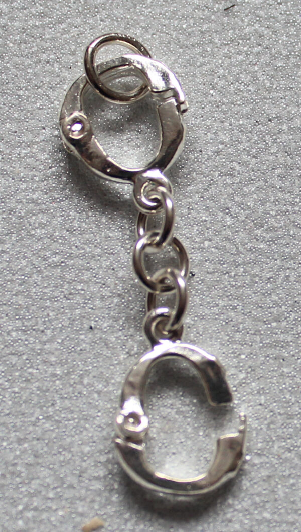 Sterling silver handcuff pendant