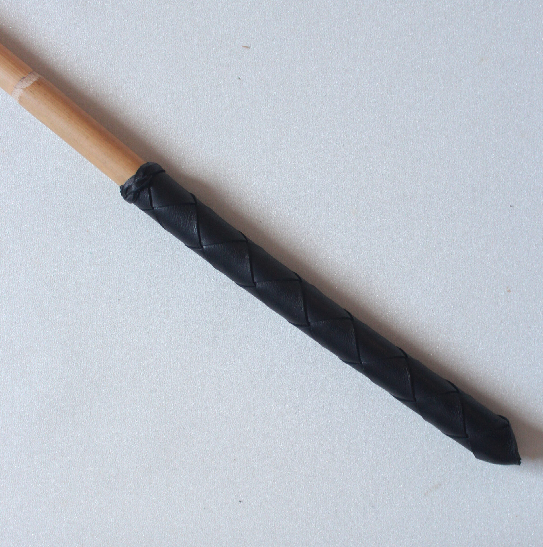 Tohiti punishment cane with braided handle option Bondatrix
