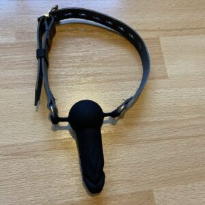 Penis dildo gag (leather strap) facing outwards