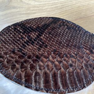 Fur and snakeprint round paddle