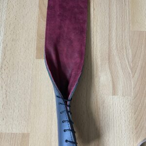 Black and red long leather BDSM paddle