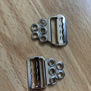 Fan lacing slides for corsets