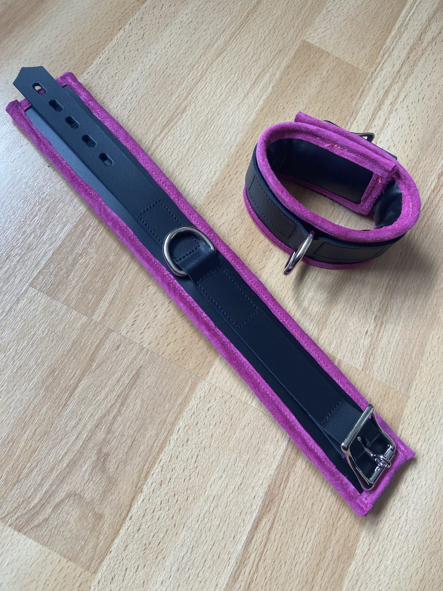 Pink BDSM cuffs