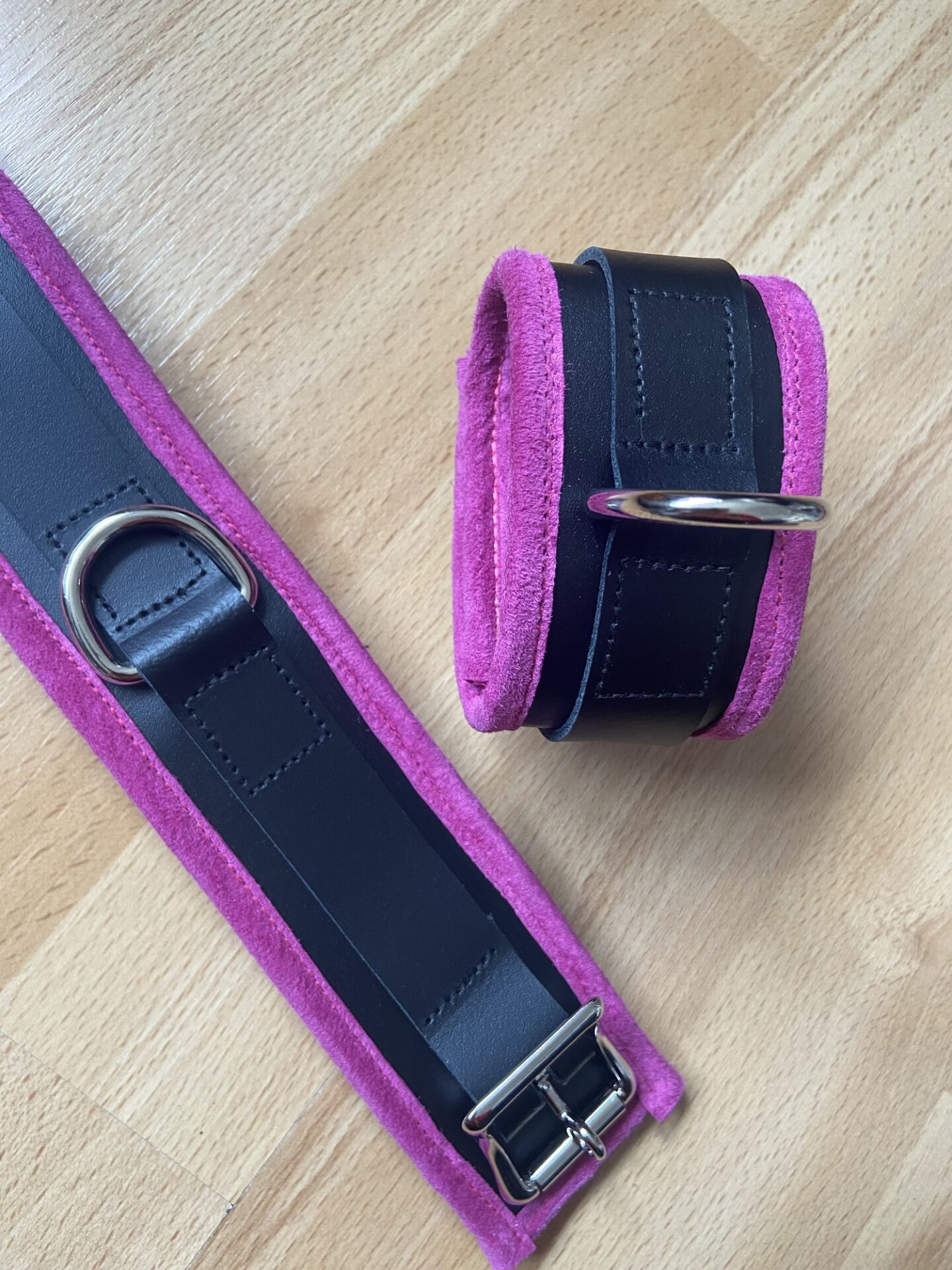 Pink BDSM cuffs